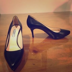 Prada black leather pumps